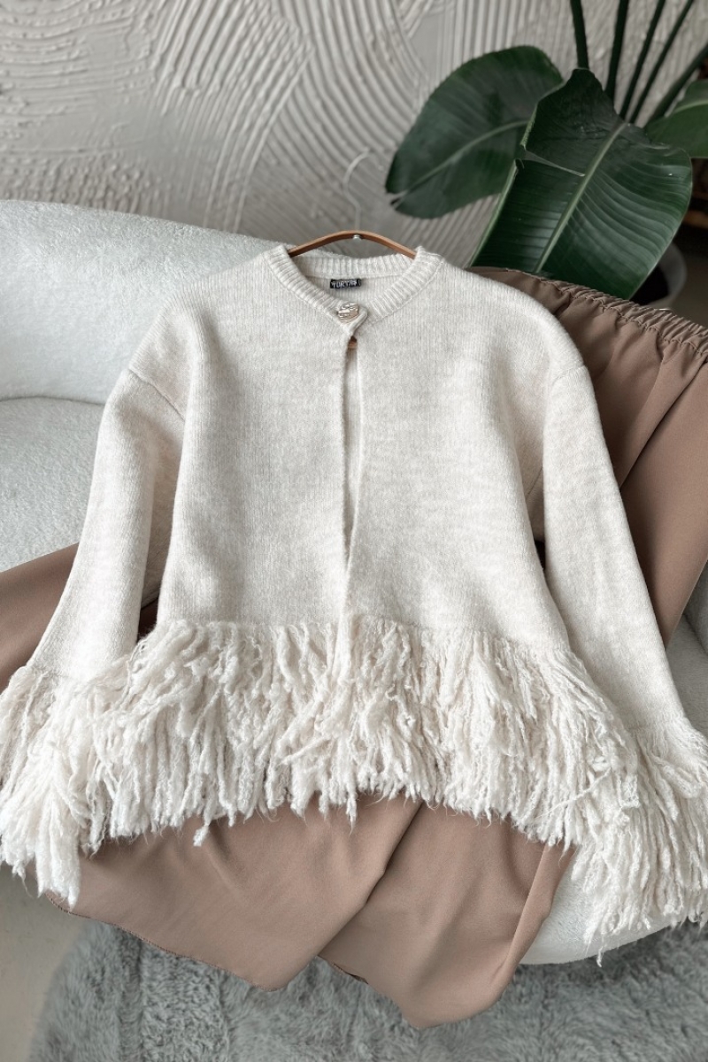 Poll Feza Beyaz Hırka