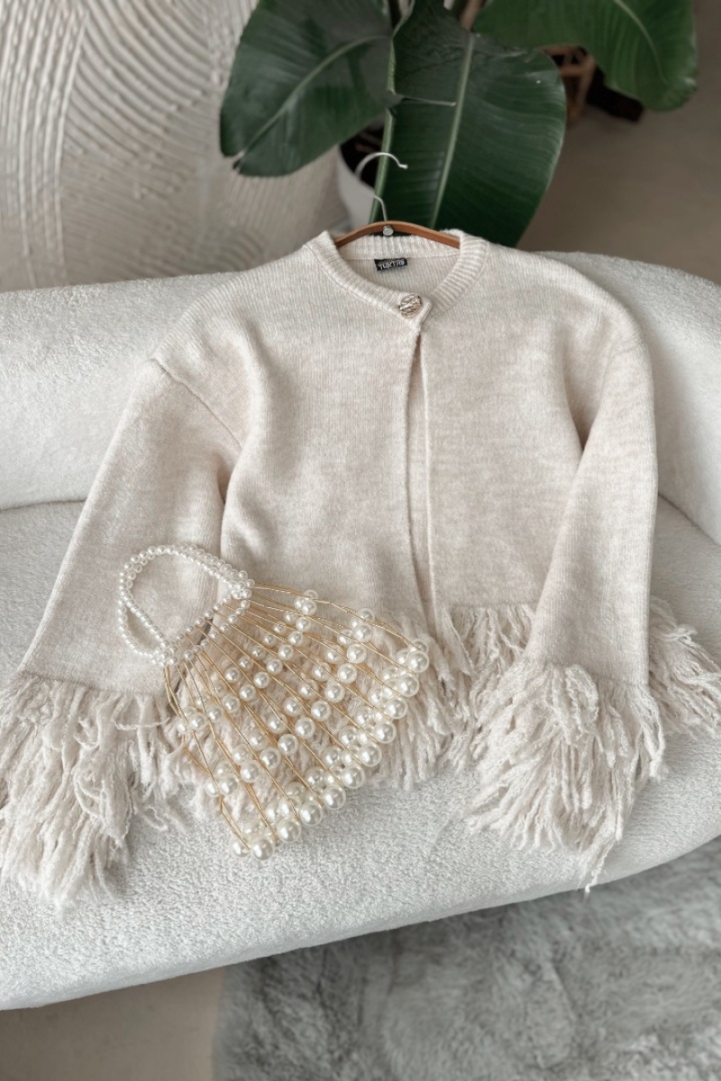 Poll Feza Beyaz Hırka